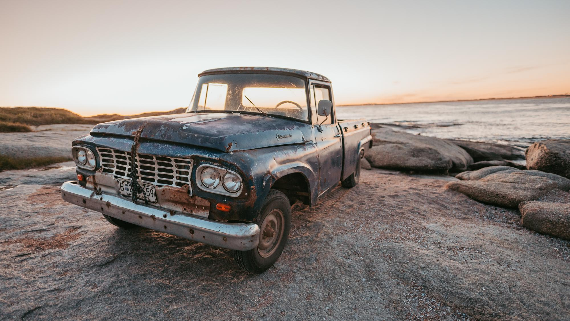 old truck on the beach